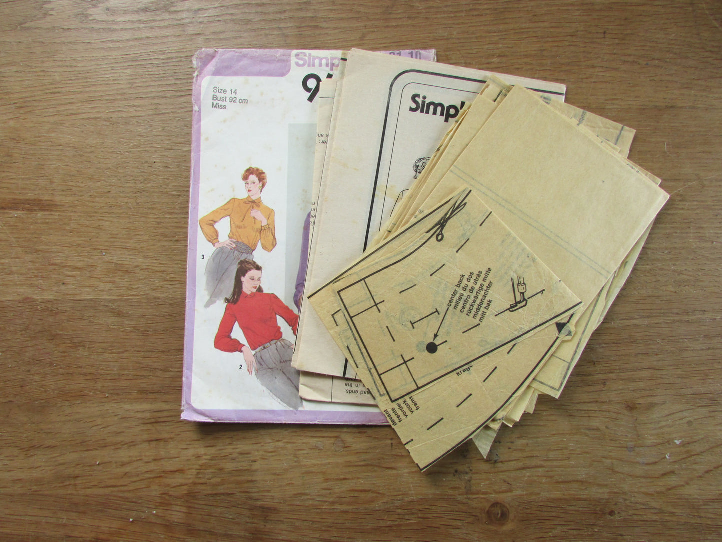 Part cut 1980 Simplicity 9658 sewing pattern for misses' back-button blouse with collar variation, size 14 (complete)