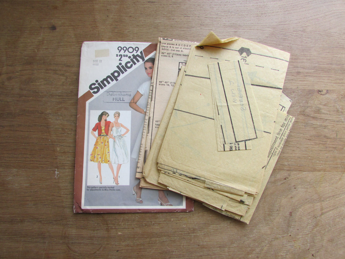 Part cut 1981 Simplicity 9909 sewing pattern for misses' pullover sundress, & unlined bolero jacket, size 12 (complete)