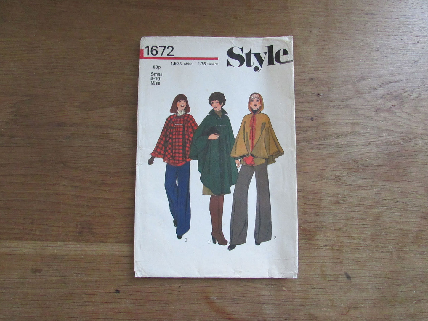 Part cut 1976 Style 1672 sewing pattern for misses' & women's poncho, size S, 8-10 (complete)