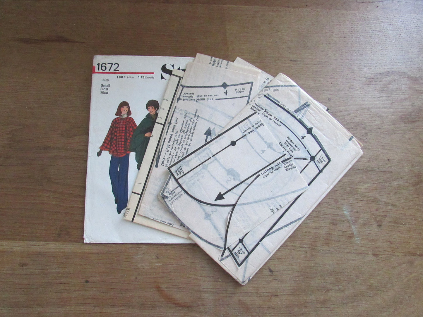 Part cut 1976 Style 1672 sewing pattern for misses' & women's poncho, size S, 8-10 (complete)