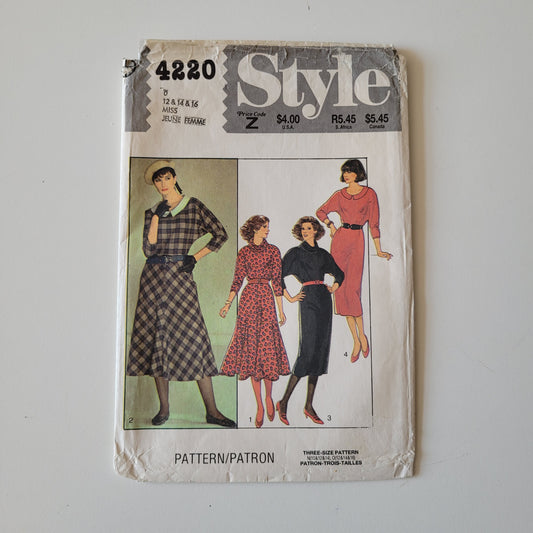 Part cut 1984 Style 4220 sewing pattern for misses' dress with collar & skirt variations (complete, part cut to size 12)