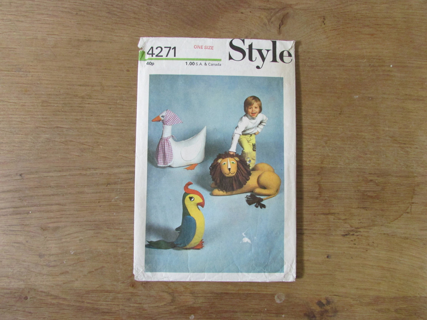 Part cut 1973 Style 4271 sewing pattern for set of stuffed toys - lion, goose, parrot (complete)