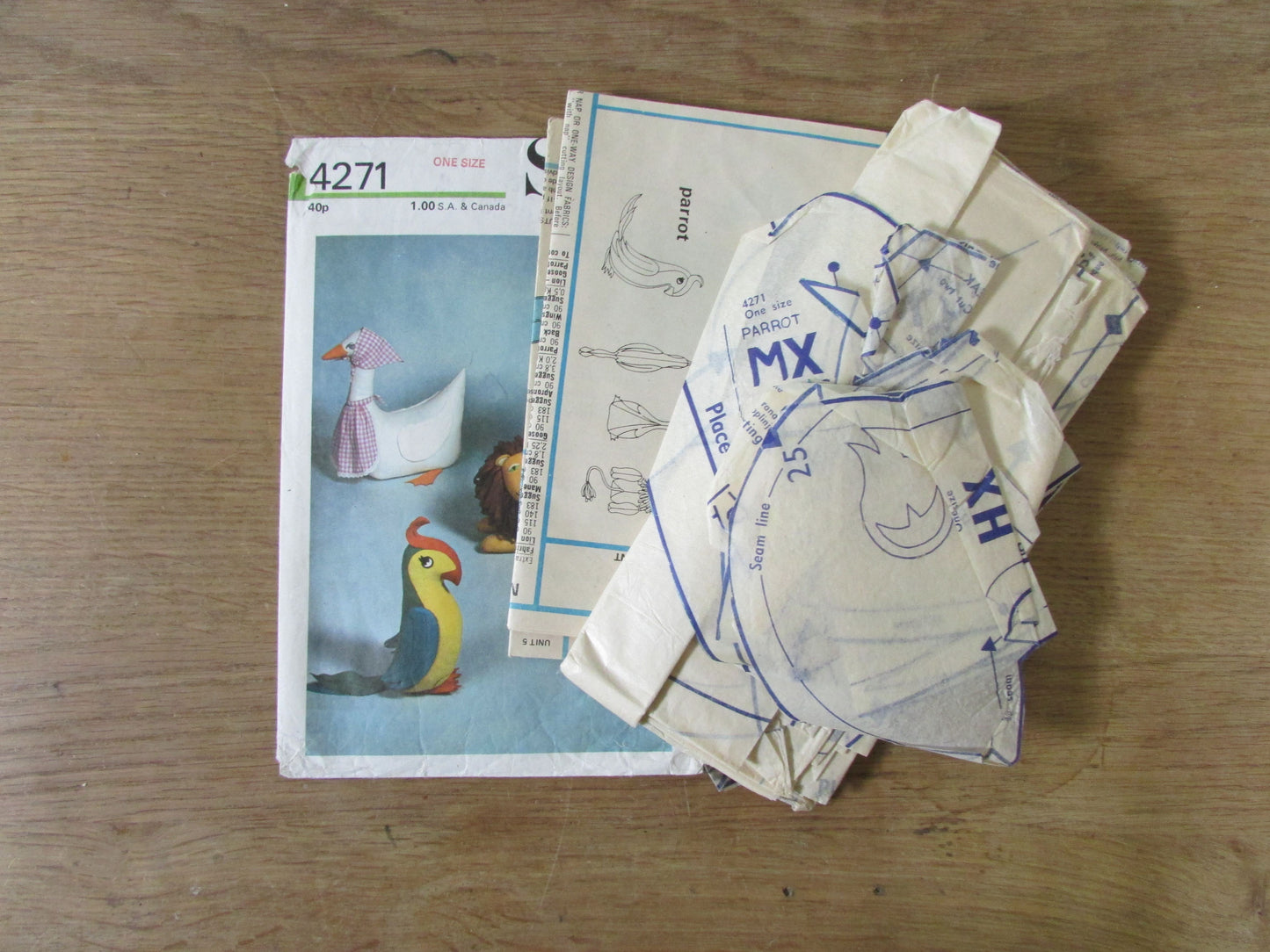 Part cut 1973 Style 4271 sewing pattern for set of stuffed toys - lion, goose, parrot (complete)