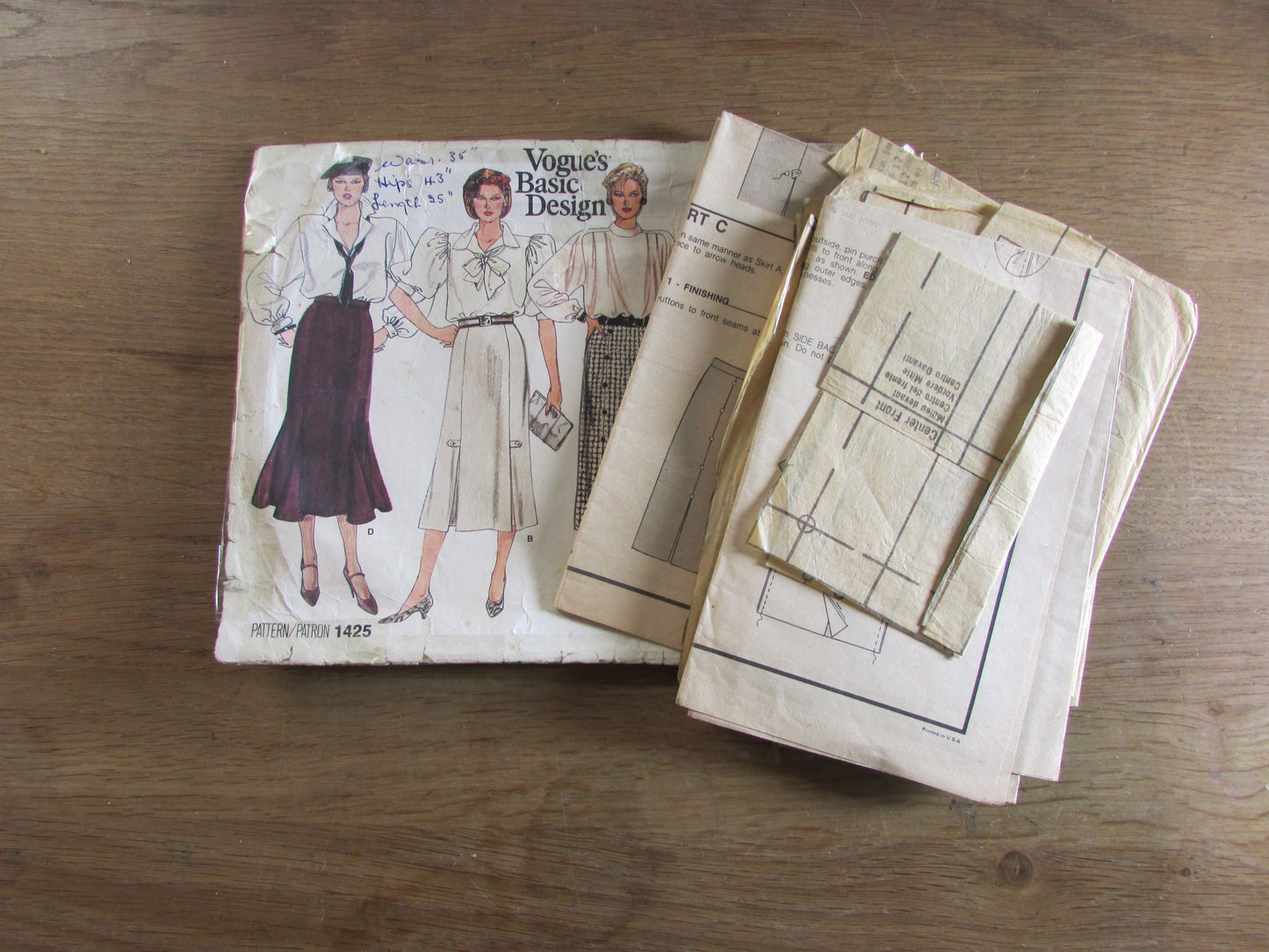 Part cut 1980s Vogue 1425 sewing pattern for misses' skirts, size 14 (complete)