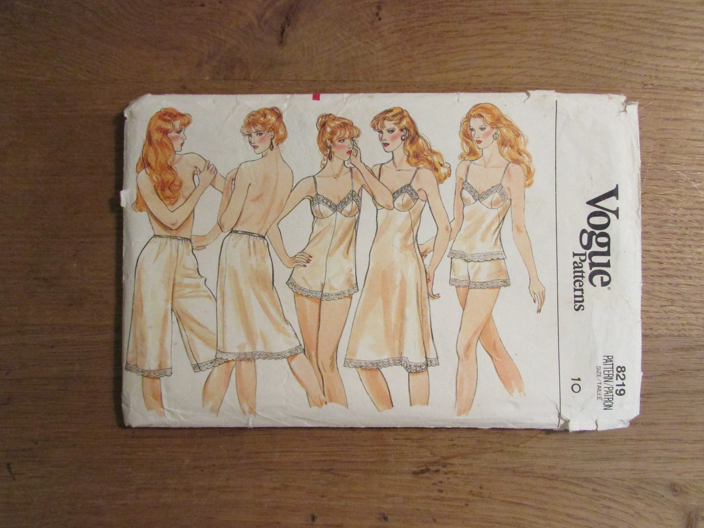Part cut 1985 Vogue 8219 sewing pattern for misses' & misses; petite camisole, teddy, slips, culotte liner and panties, size 10 (complete)