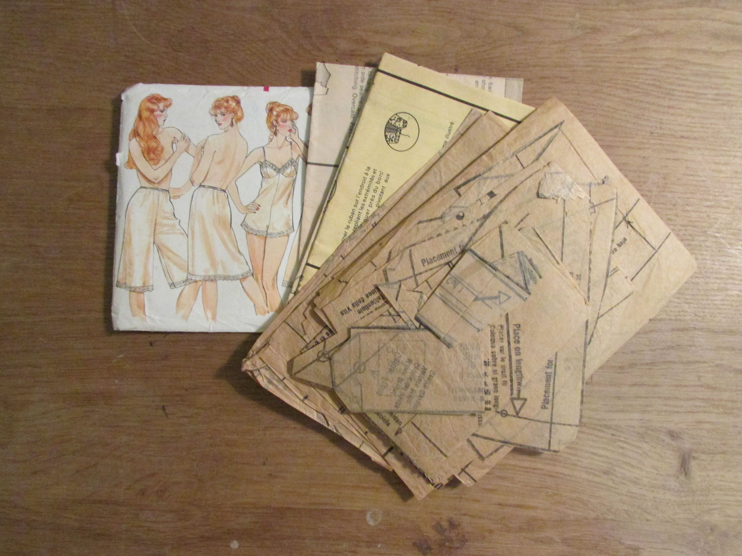 Part cut 1985 Vogue 8219 sewing pattern for misses' & misses; petite camisole, teddy, slips, culotte liner and panties, size 10 (complete)