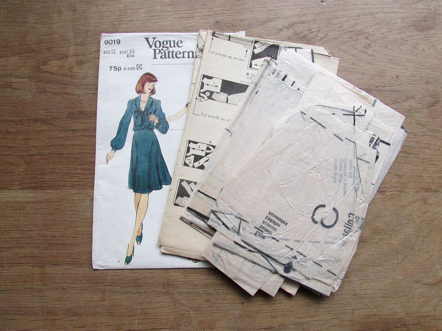 Part cut 1970s Vogue 9019 sewing pattern for misses' loose-fitting dress (see description below)