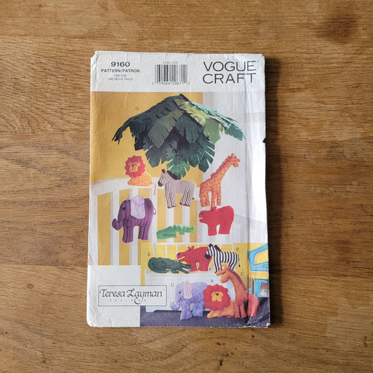 Uncut 1994 Vogue Craft 9160 sewing pattern for jungle animal pillows & mobile (complete)