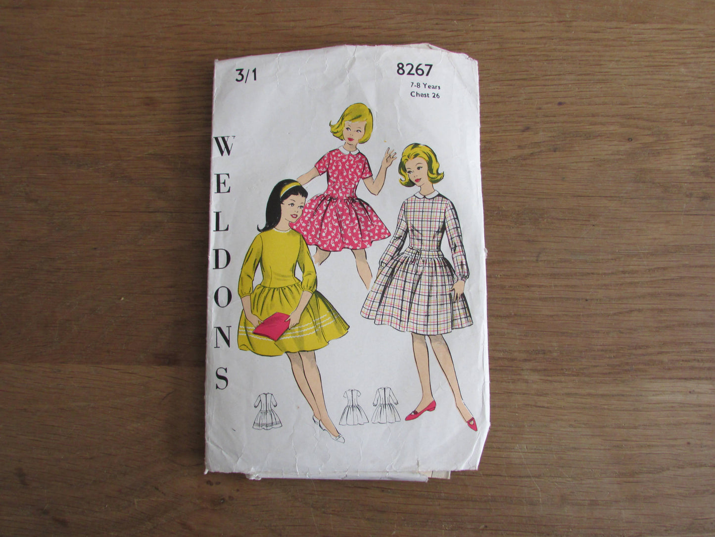 Uncut 1950s/60s Weldons 8267 sewing pattern for girl's dress with dropped waistline, & gathered skirt, size 7-8 years (complete)
