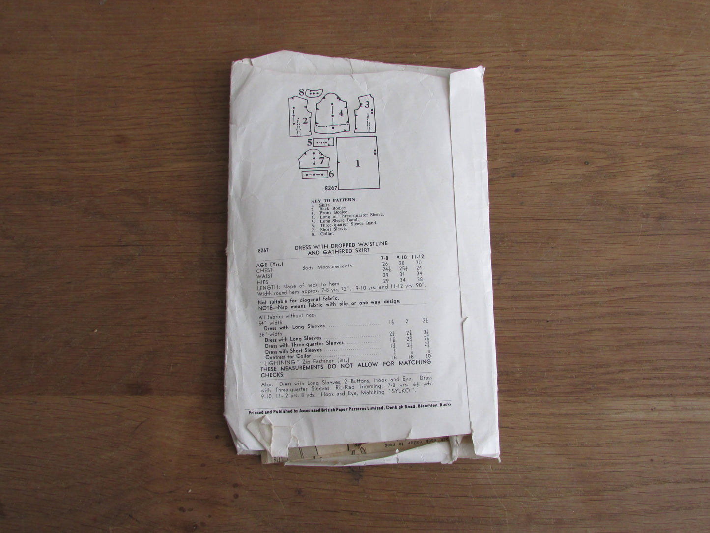 Uncut 1950s/60s Weldons 8267 sewing pattern for girl's dress with dropped waistline, & gathered skirt, size 7-8 years (complete)