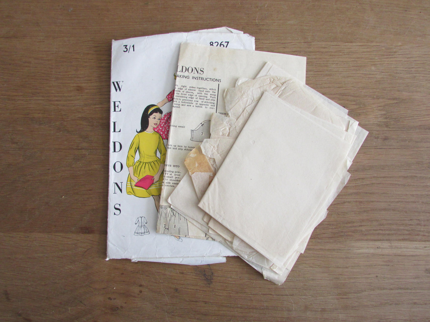 Uncut 1950s/60s Weldons 8267 sewing pattern for girl's dress with dropped waistline, & gathered skirt, size 7-8 years (complete)