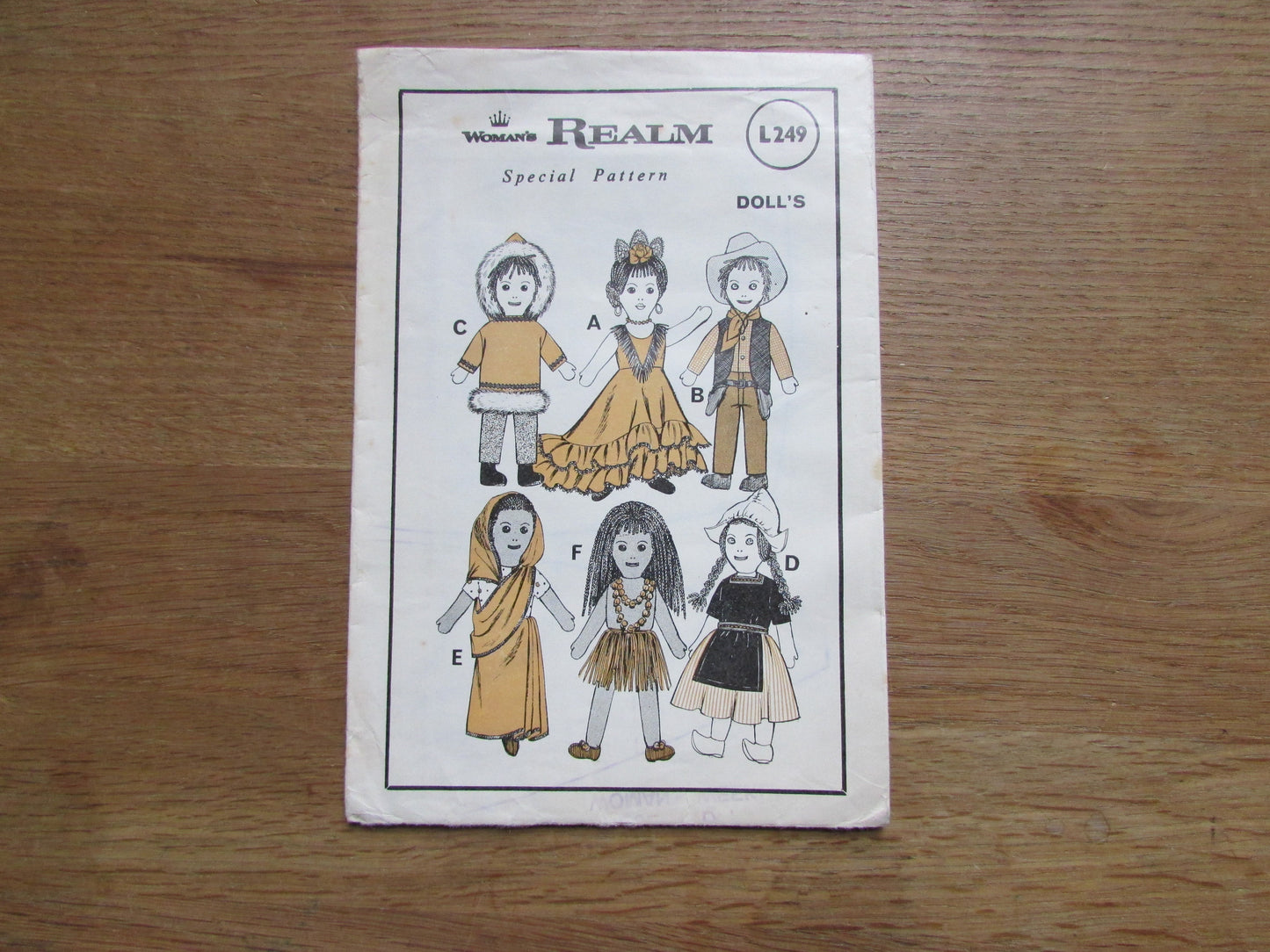 Uncut 1970s Woman's Realm L249 sewing pattern for world doll costumes (complete)