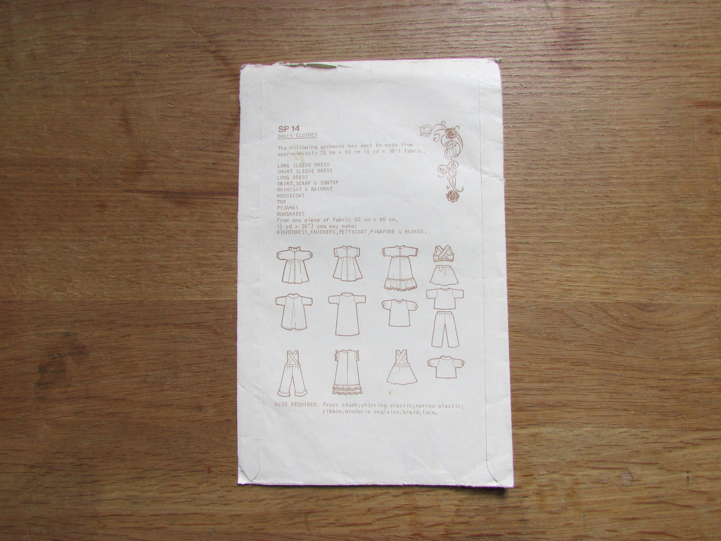 Part cut vintage Woman's Realm SP14 sewing pattern for doll clothes, to fit 12" doll (complete)