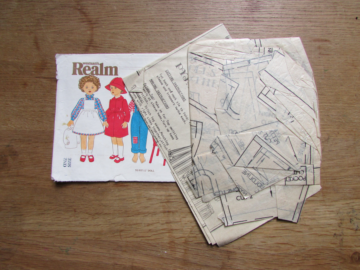 Part cut vintage Woman's Realm SP14 sewing pattern for doll clothes, to fit 12" doll (complete)